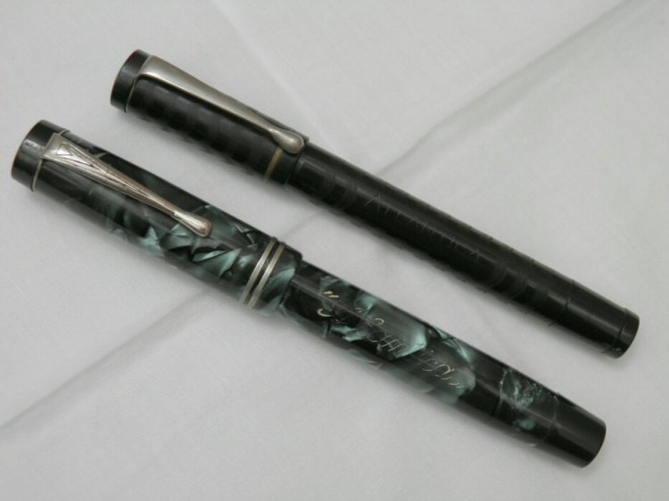 File:Atlantica-Couple-Ebonite-Celluloid-Capped.jpg