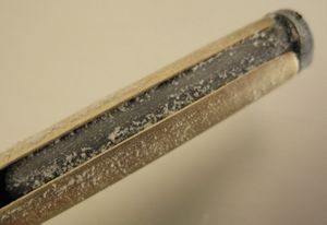 Fig. 4 - Posizionamento del supporto del sacchetto all'interno del fusto.